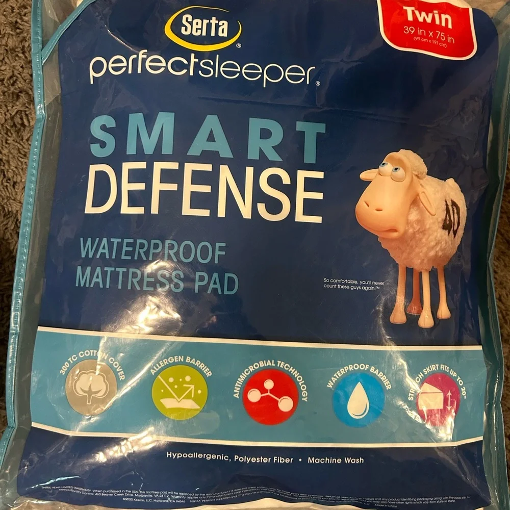 New-Serta waterproof mattress pad. Twin